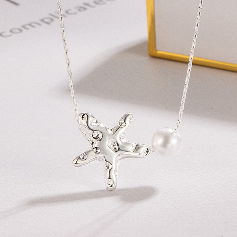 Damen Anhänger mit Sternenmotiv und Perle Shop Nory