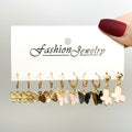 Damen Ohrschmuck Set mit verspielten Schmetterlingsanhängern Shop Nory
