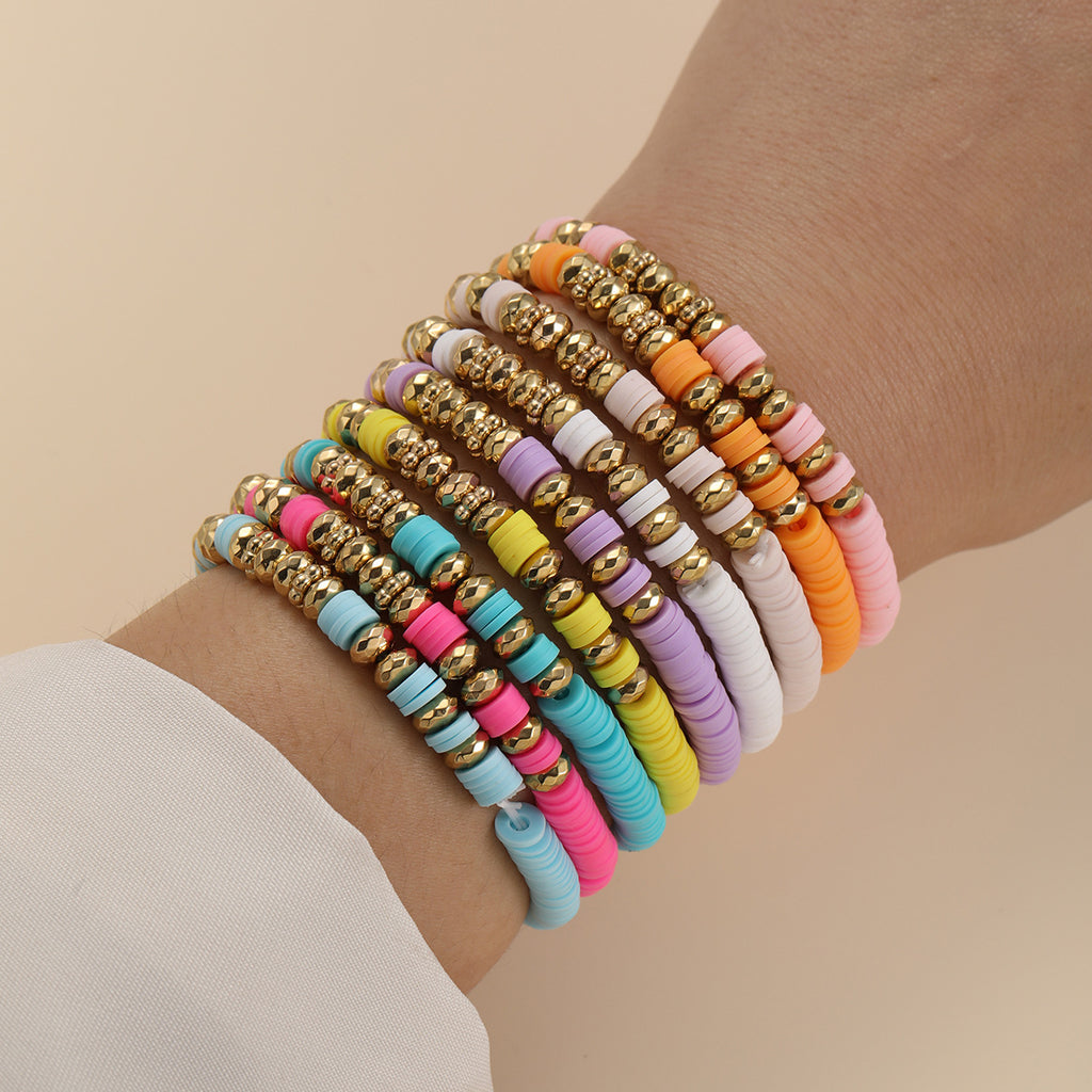 Damen Armband-Set mit bunten Perlen und goldenen Akzenten Shop Nory