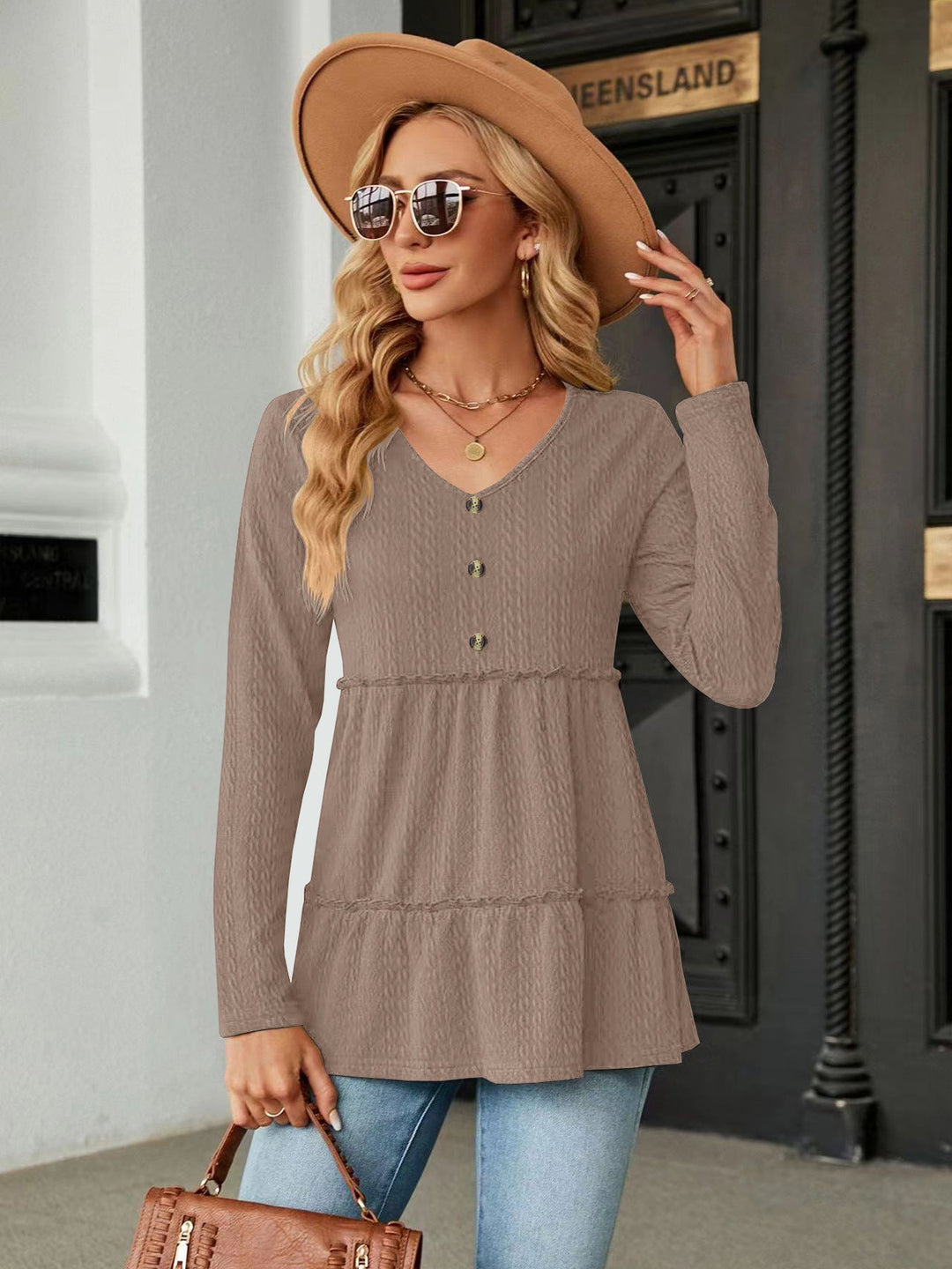 Damen Ärmelloses V-Ausschnitt Shirt mit Knopfdetails und voluminösem Saum