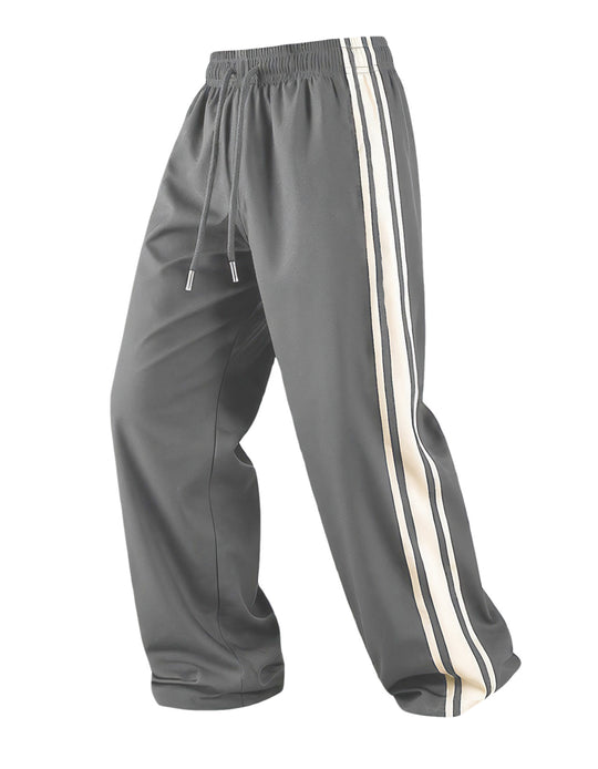 Herren Weite Trainingshose mit elastischem Tunnelzugbund, seitlichem Kontraststreifen & lockerem Baggy‑Schnitt Shop Nory