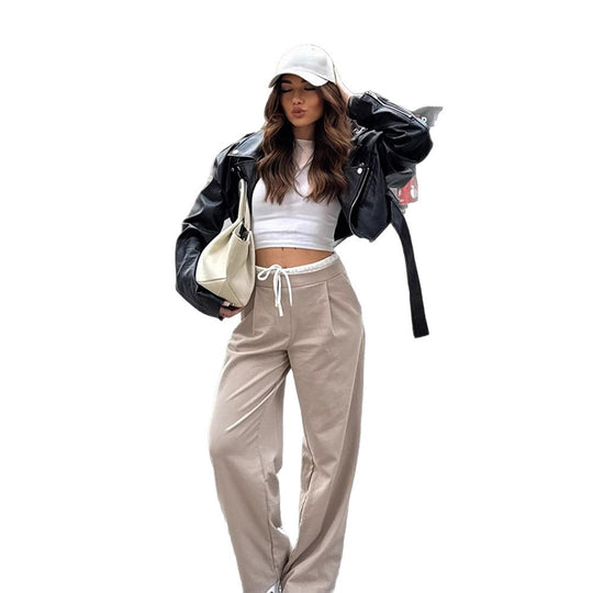 Damen Kurzgeschnittene Bikerjacke aus Kunstleder mit taillierendem Bindegürtel und markanten Epauletten Shop Nory