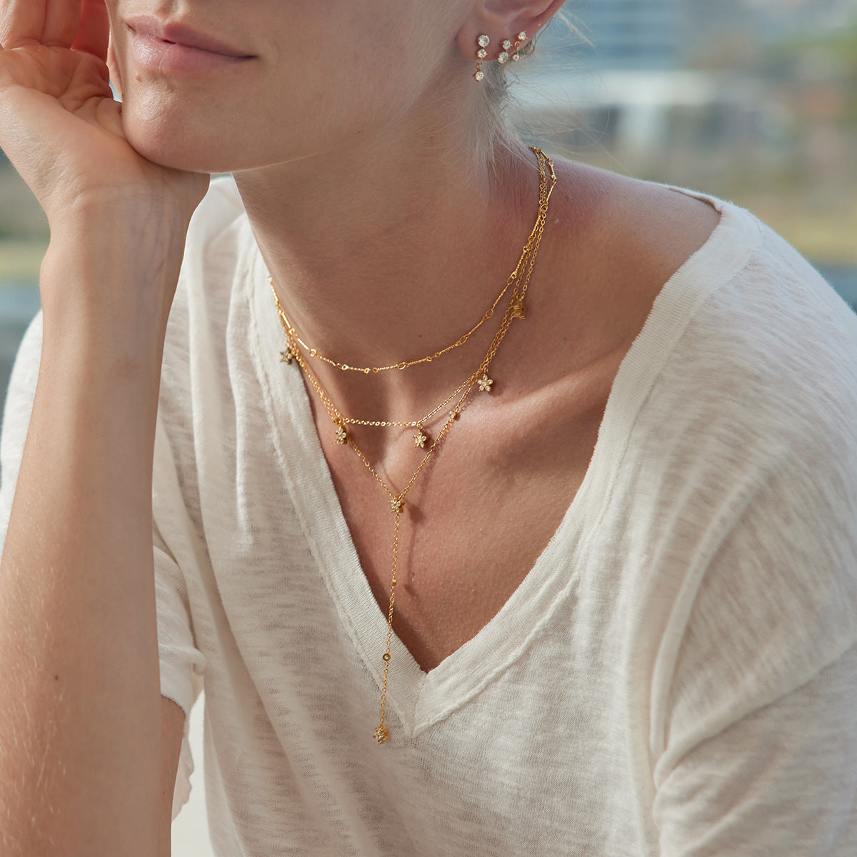 Damen Halskette mit mehrlagigem Design und funkelndem Sternanhänger Shop Nory