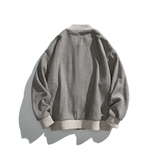 Unisex Boxy-Bomberjacke im Fischgrät-Look mit Rippbündchen, Pattentaschen und verdeckter Druckknopfblende Shop Nory