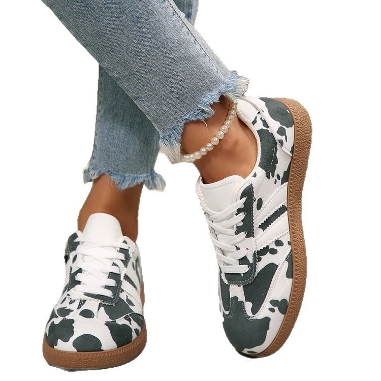Damen Retro-Lowtop-Sneaker mit Kuhflecken-Print und gepolsterter Komfortsohle Shop Nory