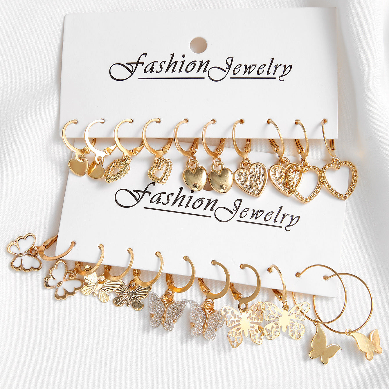 Damen Ohrstecker Set mit inspirierenden Herz- und Schmetterlingsanhängern Shop Nory