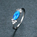 Damen Ring mit schillerndem Opal und funkelnden Zirkonia Shop Nory