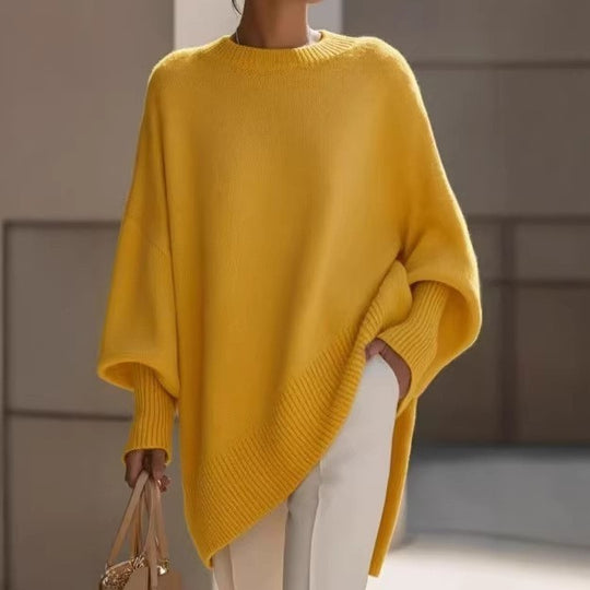 Damen nan Oversize Strickponcho mit asymmetrischem Saum und gerippten Ärmeln Shop Nory