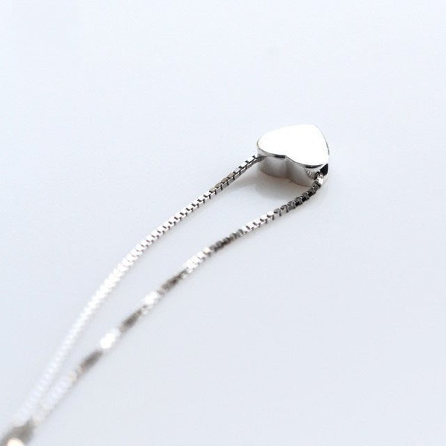 Damen Halskette mit herzförmigem Anhänger aus hochwertigem Edelstahl Shop Nory