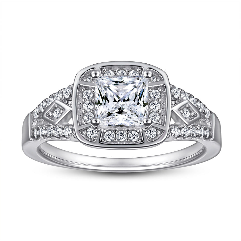 Damen eleganter Verlobungsring mit quadratischem Hauptstein und funkelnden Zirkonia-Details Shop Nory