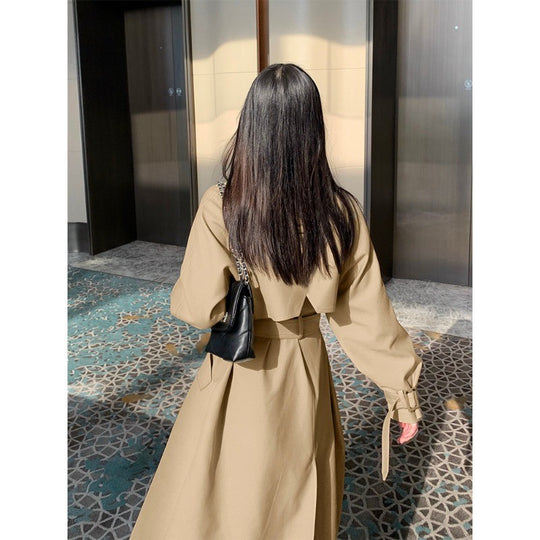 Damen Eleganter Midi-Trenchcoat mit Oversize-Schulterklappe, gerafften Ärmeln und taillierendem Bindegürtel Shop Nory