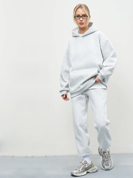 Damen lässiges Kapuzen-Sweatset aus schwerer Baumwollfleece mit Kängurutasche und gerader Jogginghose Shop Nory