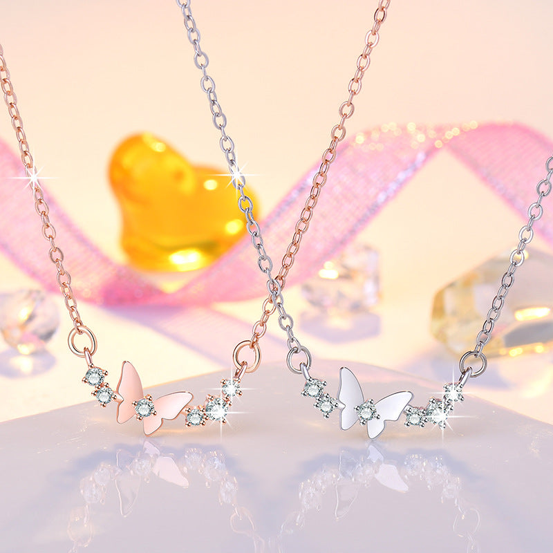 Damen Halskette mit filigranem Schmetterlingsdesign und funkelnden Zirkonia Shop Nory