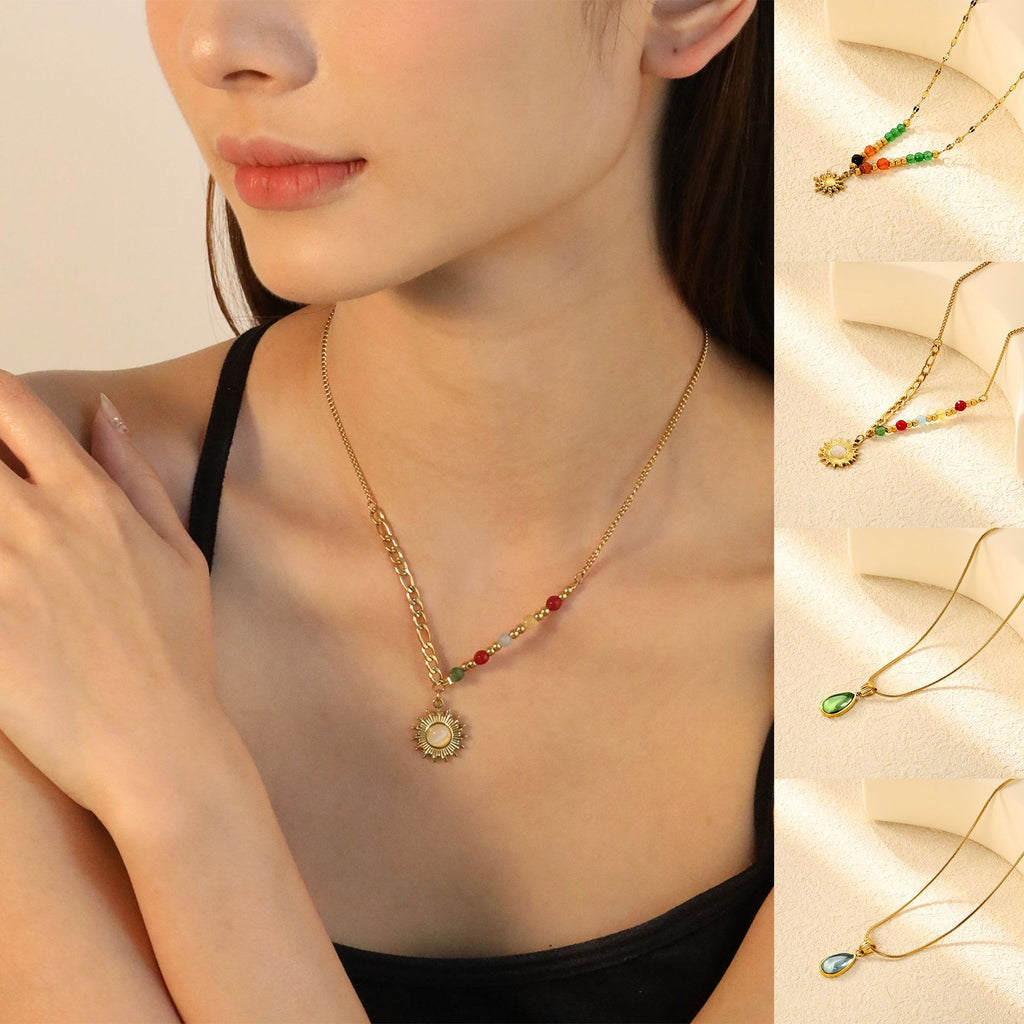Damen Halskette mit Sonnenanhänger und bunten Kristallakzenten Shop Nory