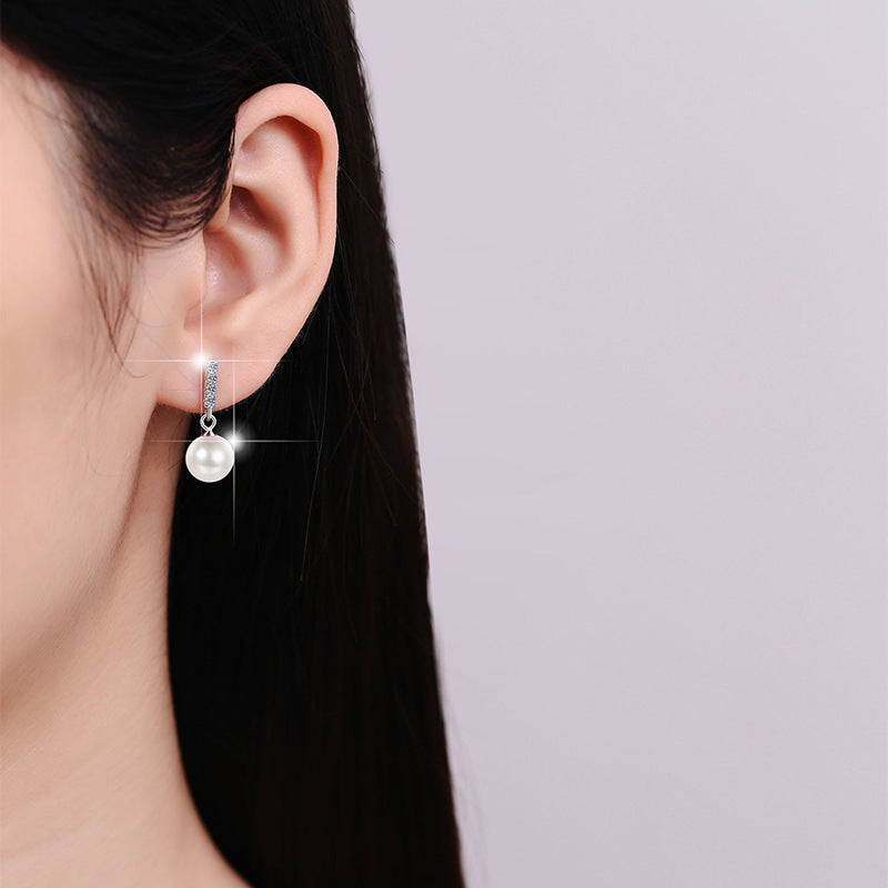 Damen Ohrstecker mit funkelndem Kristall und hochwertiger Perle Shop Nory