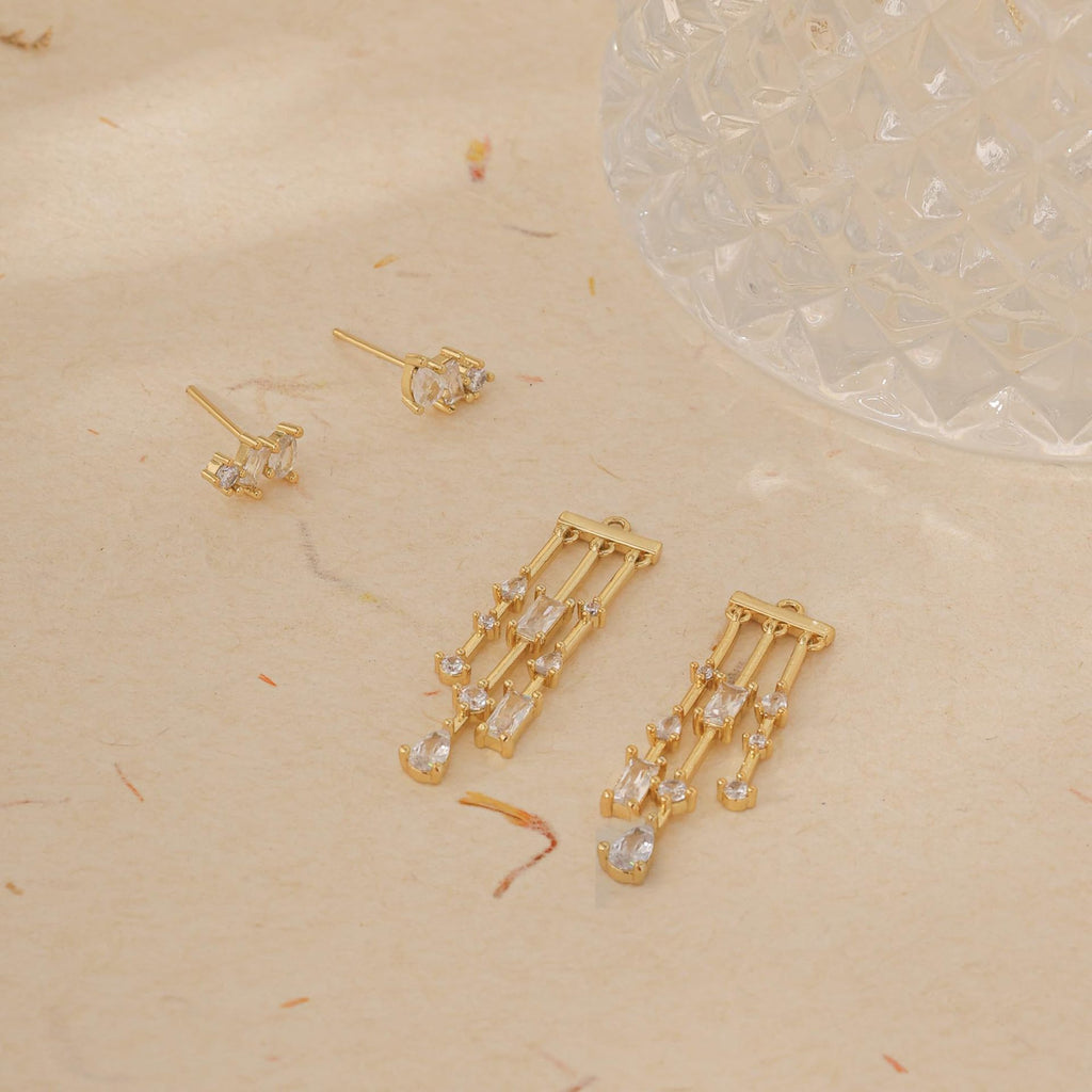 Damen Ohrhänger mit funkelnenden Zirkonia und eleganter Kettenstruktur Shop Nory