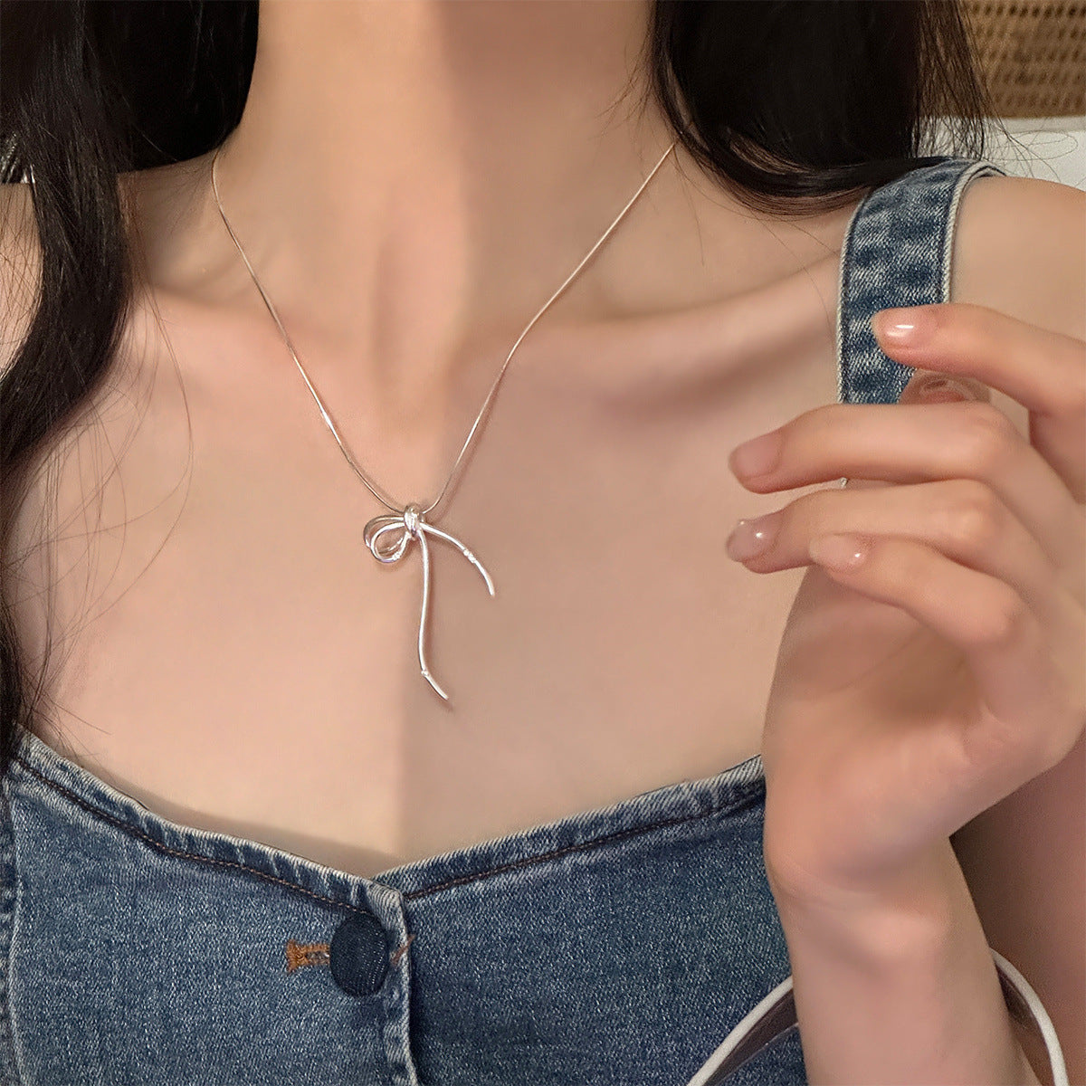 Damen Halskette mit elegantem Schleifenanhänger aus hochwertigem Silber Shop Nory