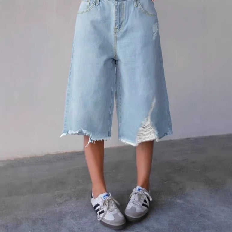 Damen Weite Denim-Culotte mit hohem Bund, Distressed-Details und rohem Saum Shop Nory