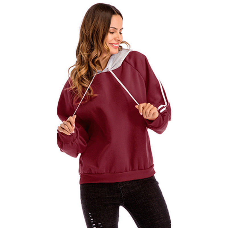 Damen modischer Kapuzenpullover mit kontrastierenden Ärmeln und lässigem Schnitt Shopnory