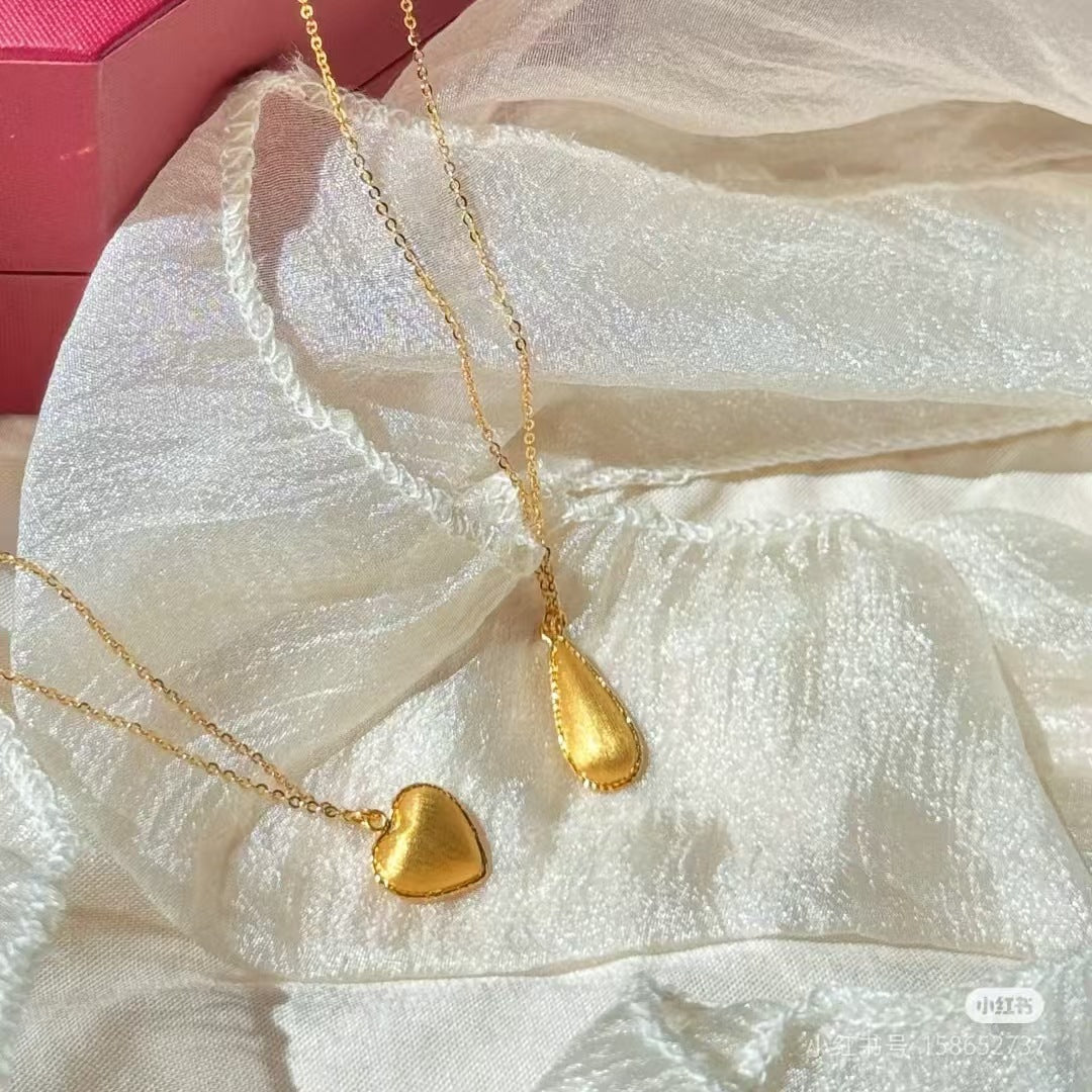Damen Halskette mit herzförmigem Anhänger aus glänzendem Metall Shop Nory