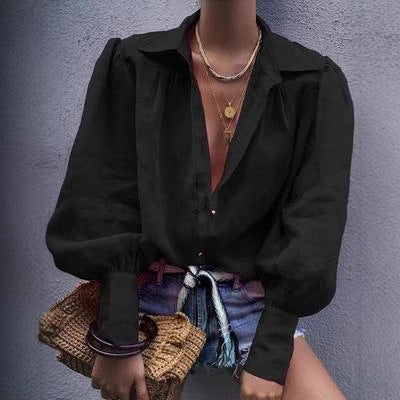 Damen Bluse mit voluminösen Ärmeln und elegantem Kragen