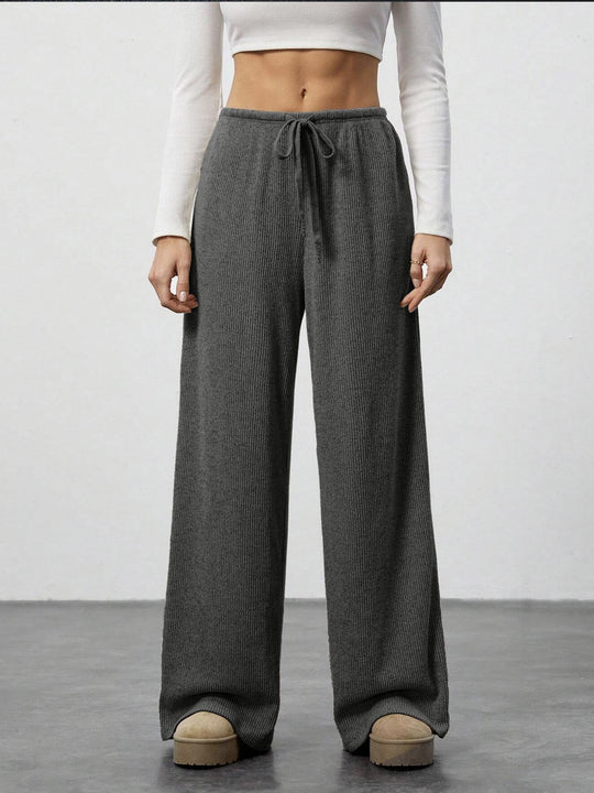 Damen Weit geschnittene Relax-Hose aus elastischem Strickmaterial mit Kordelzug