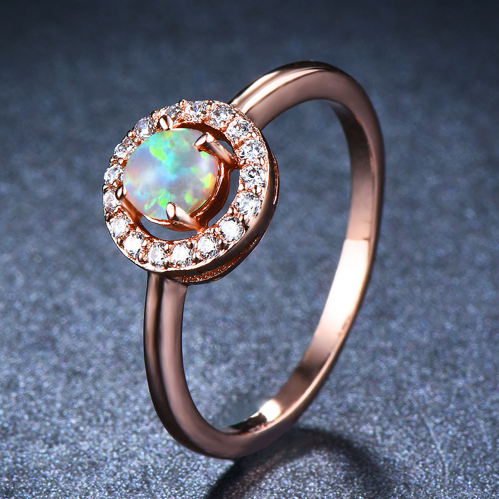 Damen Ring mit schimmerndem Opal und funkelnden Zirkoniastein-Verzierungen Shop Nory