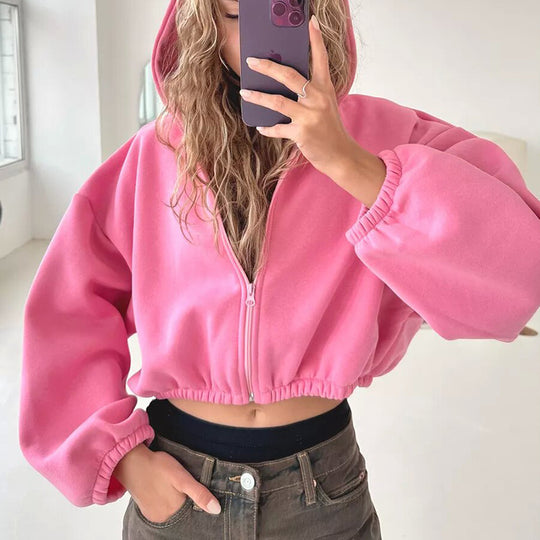 Damen kurzes Oversize-Kapuzen-Sweatshirt mit Reißverschluss, Ballonärmeln und elastischem Saum Shop Nory