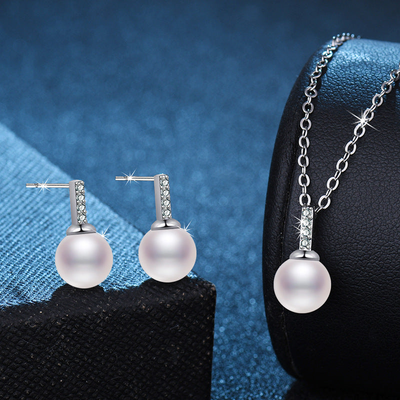 Damen elegante Ohrringe mit Perlen und Zirkonia-Details Shop Nory