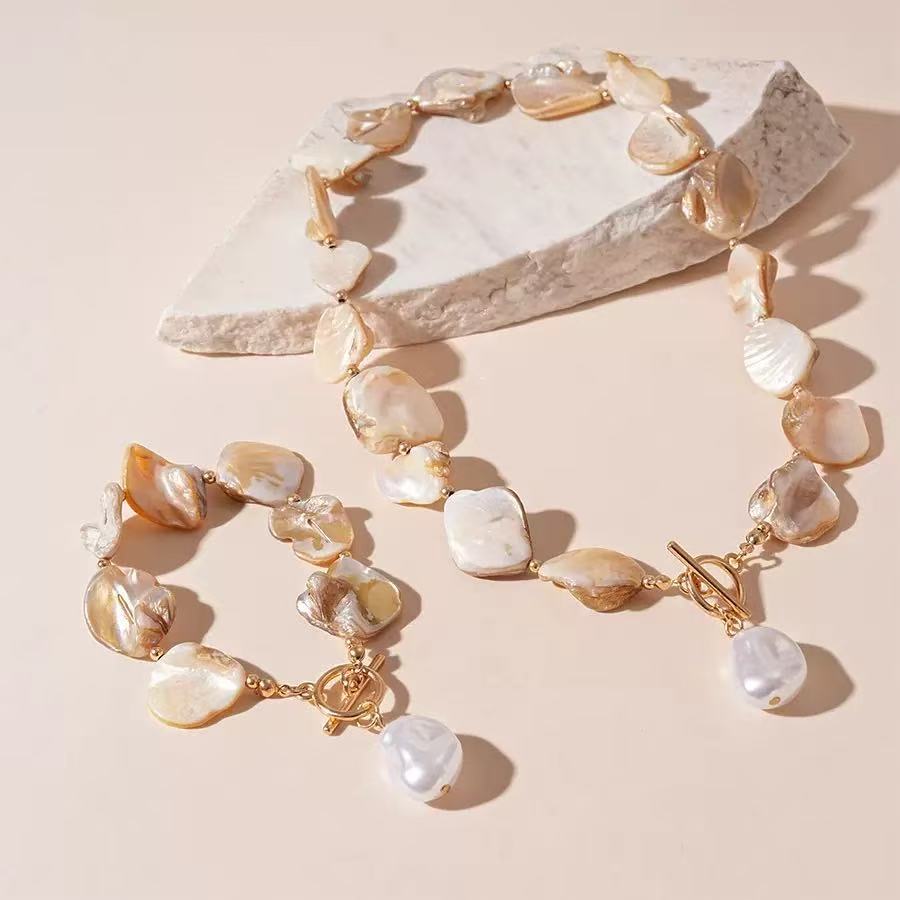 Damen Schmuckset aus einzigartigen Muschelhelen und edlem Goldverschluss Shop Nory