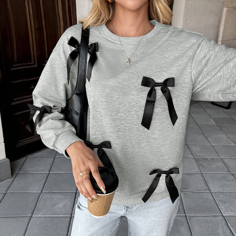 Damen Sweatshirt mit Satin‑Schleifenbesatz und Rundhalsausschnitt Shop Nory