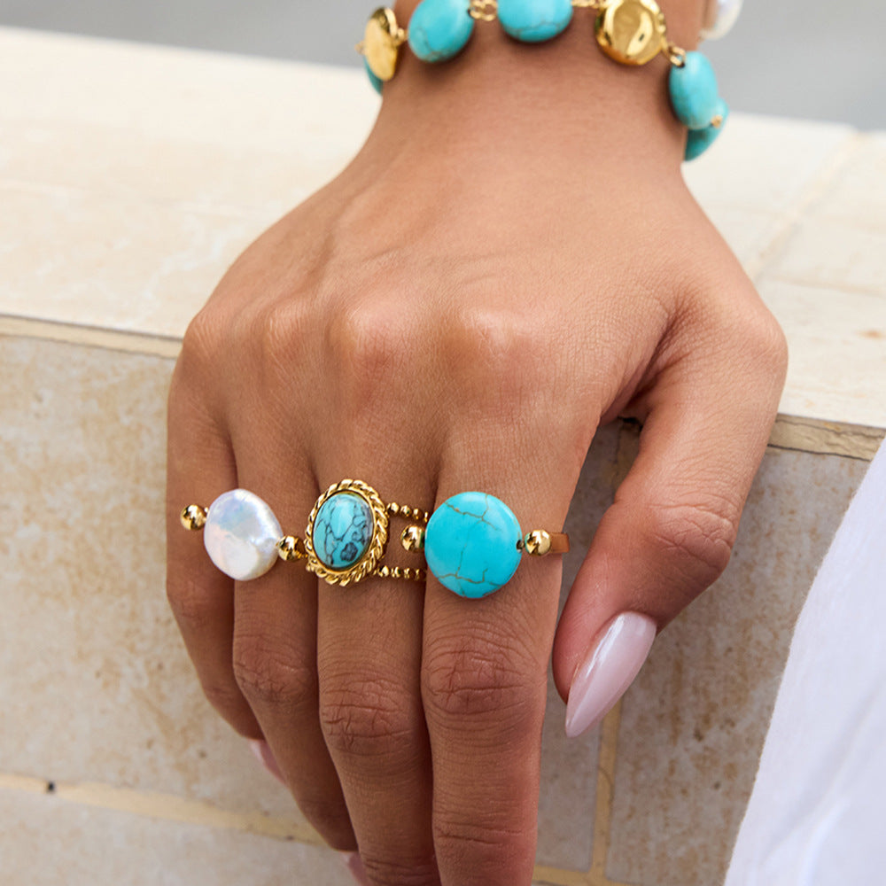 Damen Offener Ring mit funkelndem Türkis-Edelstein und eleganter Edelstahlverarbeitung Shop Nory