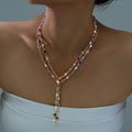 Damen Halskette mit bunten Kristallen und filigranem Design Shop Nory