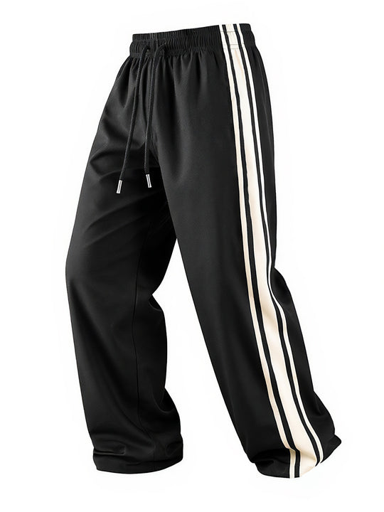 Herren Weite Trainingshose mit elastischem Tunnelzugbund, seitlichem Kontraststreifen & lockerem Baggy‑Schnitt Shop Nory