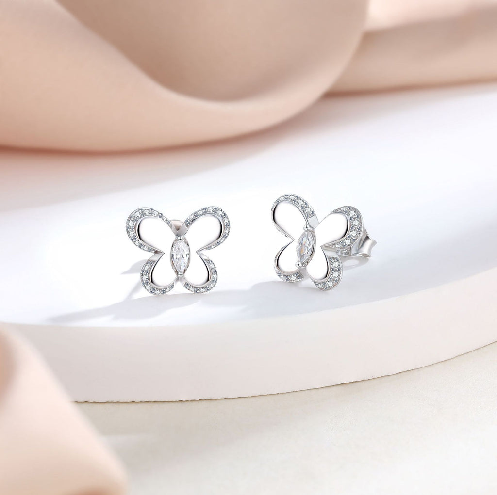 Damen Ohrringe im Schmetterlingsdesign mit funkelnden Zirkonia-Details Shop Nory