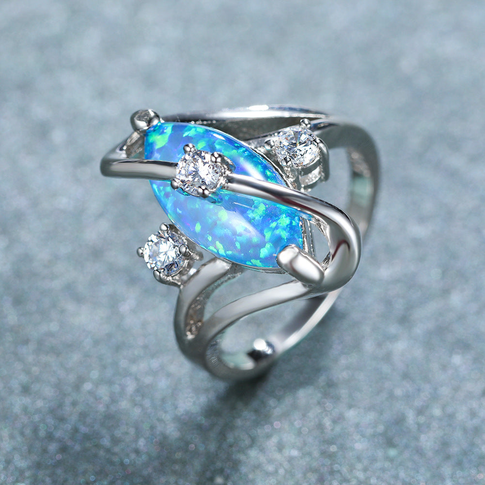 Damen Ring mit funkelndem Opal und eleganten Zirkonia-Details Shop Nory