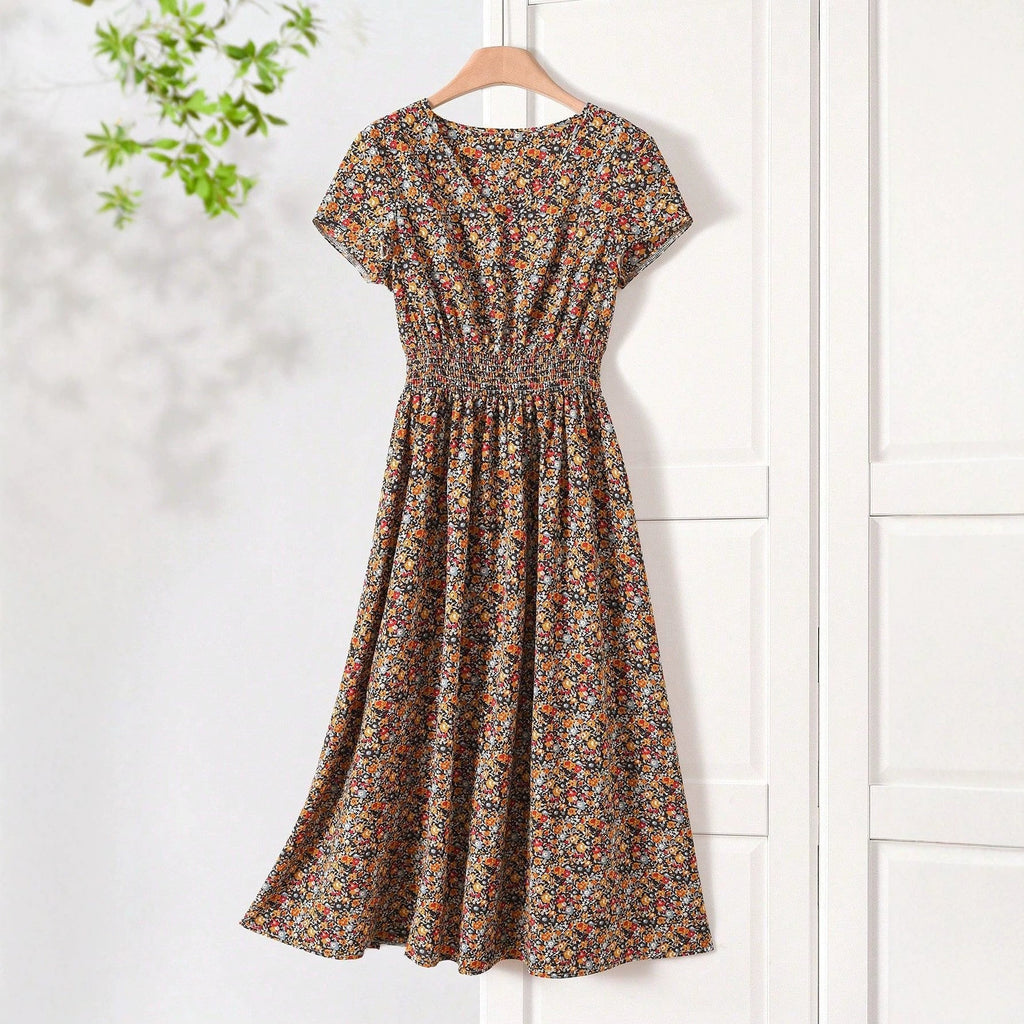 Damen Sommerliches Midikleid mit elastischem Bund und floralen Mustern