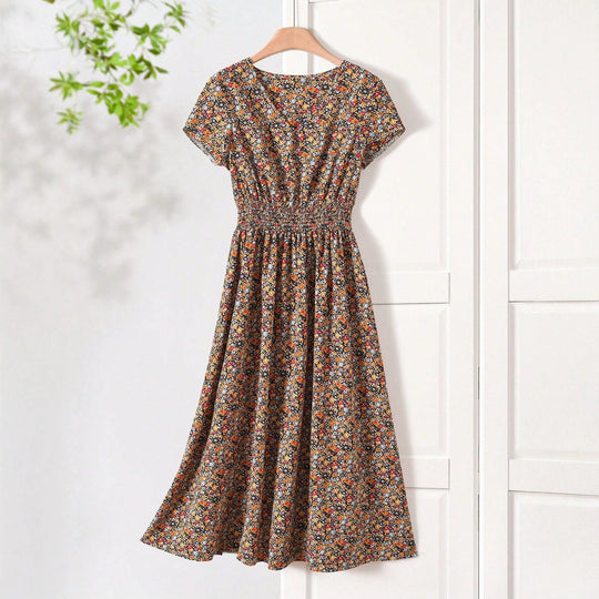 Damen Sommerliches Midikleid mit elastischem Bund und floralen Mustern