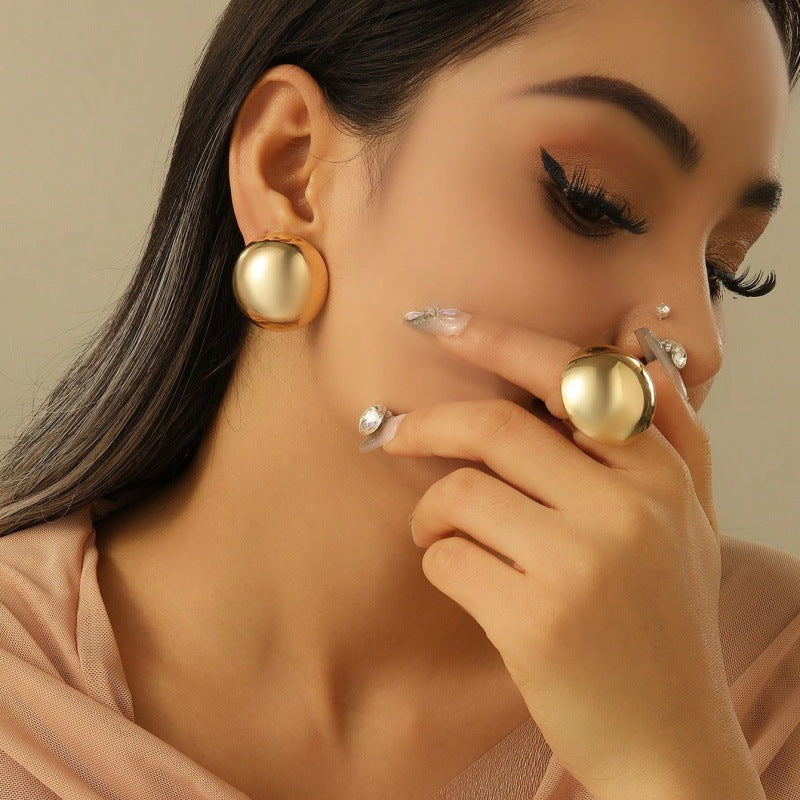 Damen Ohrringe mit klassischem, glänzendem Kugeldesign Shop Nory