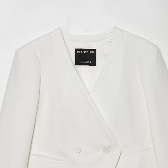 Damen gekürzter doppeltreihiger Blazer mit V‑Ausschnitt und Umschlagärmeln Shop Nory