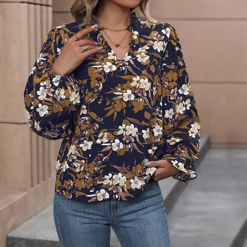 Damen Leichte Chiffonbluse mit floralem Alloverprint, V-Ausschnitt und voluminösen Bündelärmeln Shop Nory