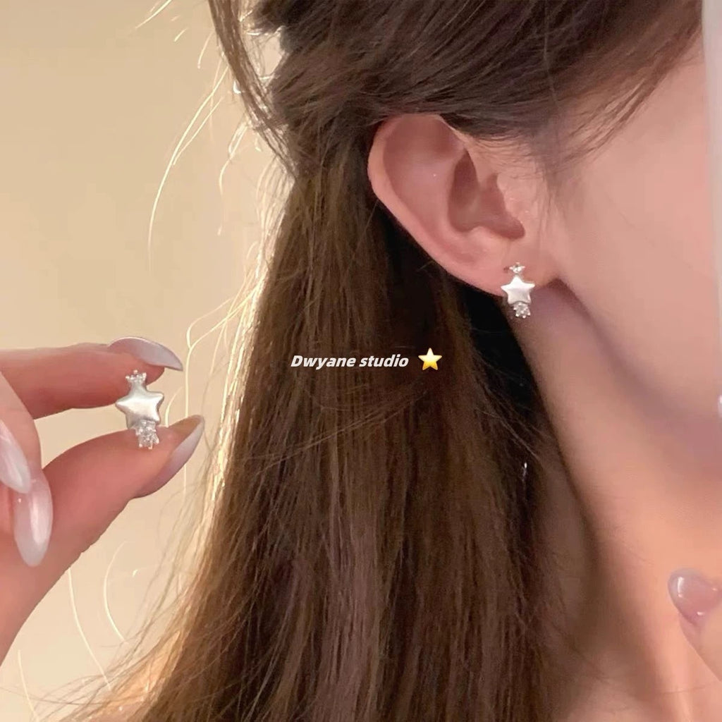 Damen Ring mit funkelndem Stern und eleganten Ziersteinen Shop Nory