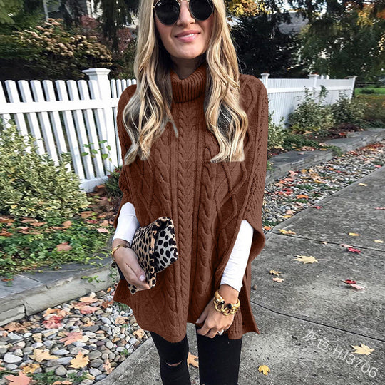 Damen nan kastiger Strickponcho mit hohem Rollkragen, Zopfstruktur und seitlichen Schlitzen Shop Nory
