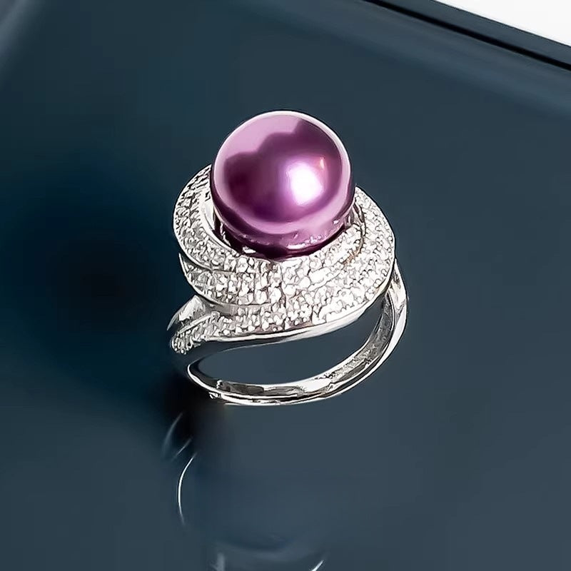 Damen glamouröser Ring mit bezauberndem Perlen-Cocktail und funkelnden Akzenten Shop Nory