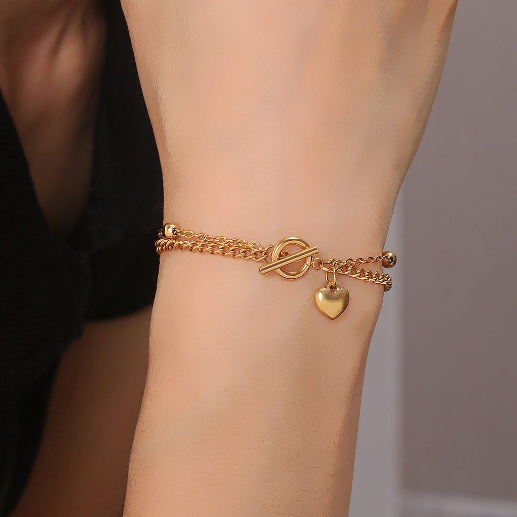 Damenarmband mit Herzanhänger aus hochwertigem Metall Shop Nory