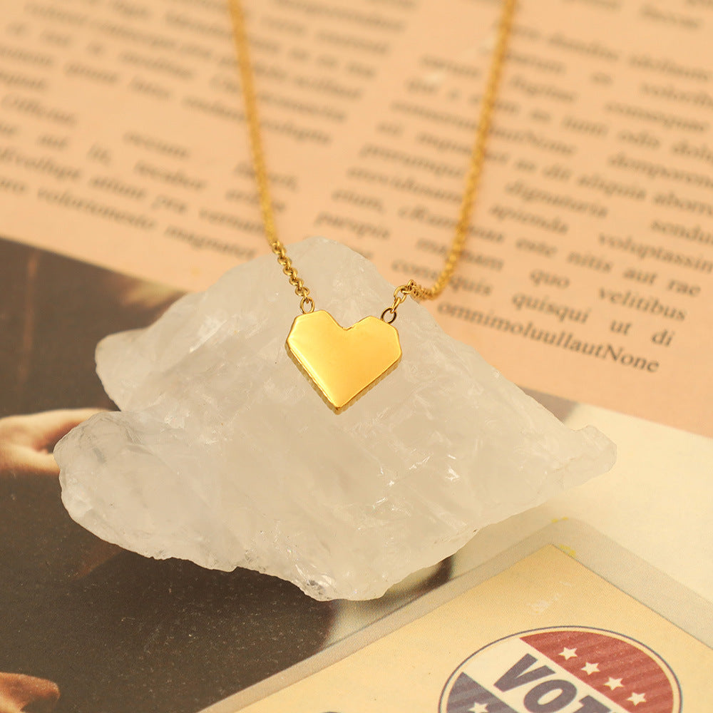 Damen Halskette mit herzförmigem Anhänger und feiner Goldverzierung Shop Nory