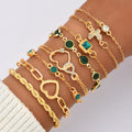 Damen Armband-Set mit funkelnden und eleganten goldenen Verzierungen Shop Nory