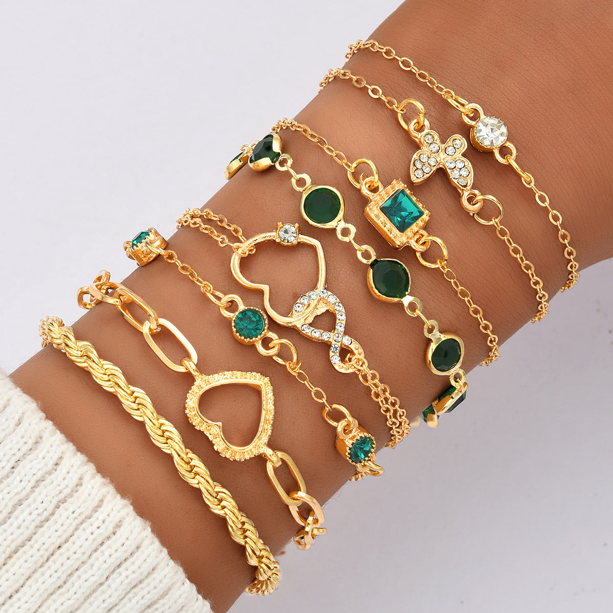 Damen Armband-Set mit funkelnden und eleganten goldenen Verzierungen Shop Nory