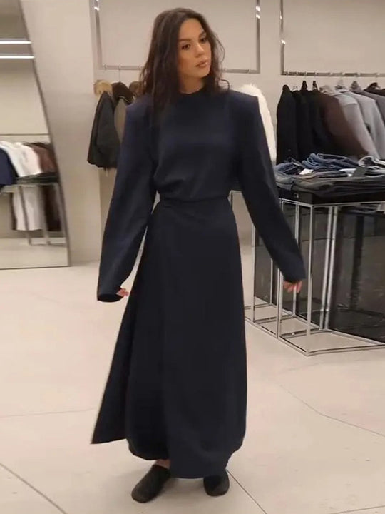 Damen Maxikleid mit taillierter Silhouette, ausgestelltem Rock und markanten Schultern Shop Nory