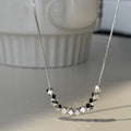 Damen Halskette mit geometrischen, glänzenden Kubelementen Shop Nory